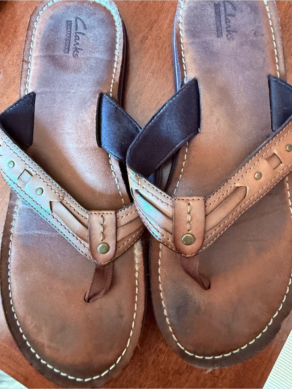 Clarks Men’s Brown Leather Toe-Post Sandals with Brass Accents